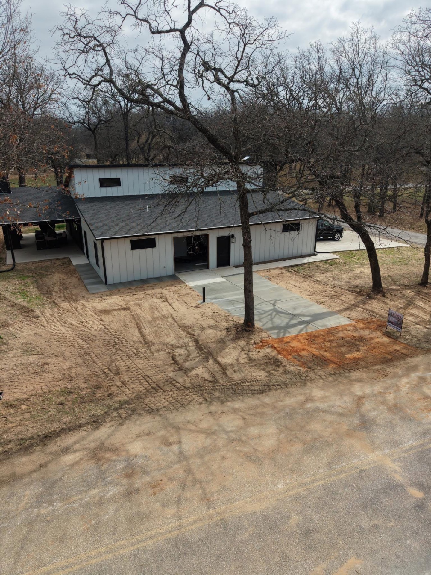 Barndominium Driveway Through the Oaks