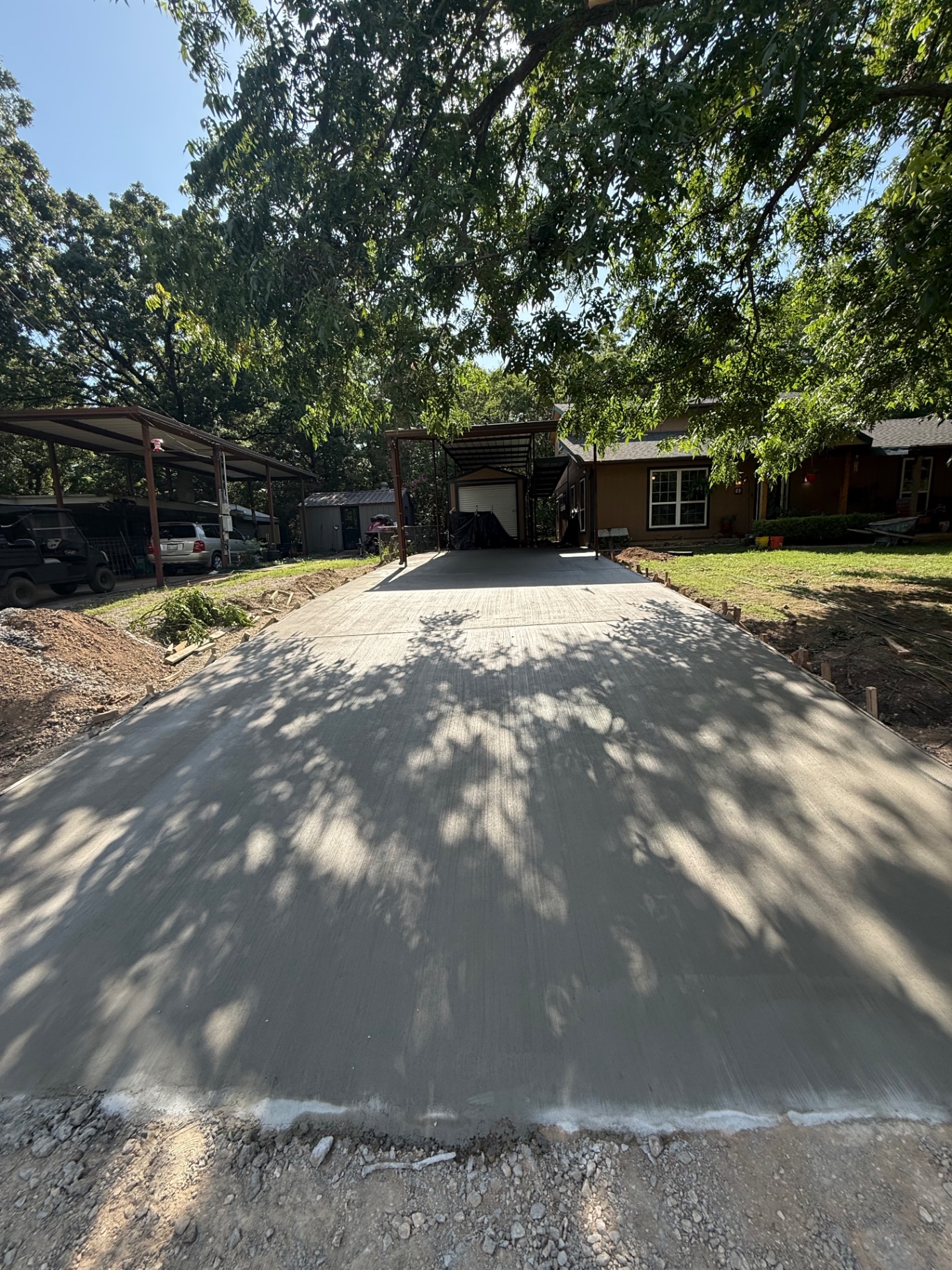 Broom-Finish Driveway to Carport